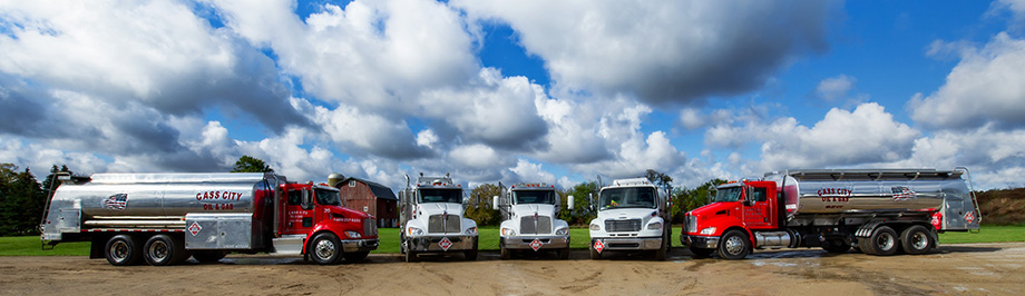 Image of tanker trucks owned by Cass City Oil and Gas company